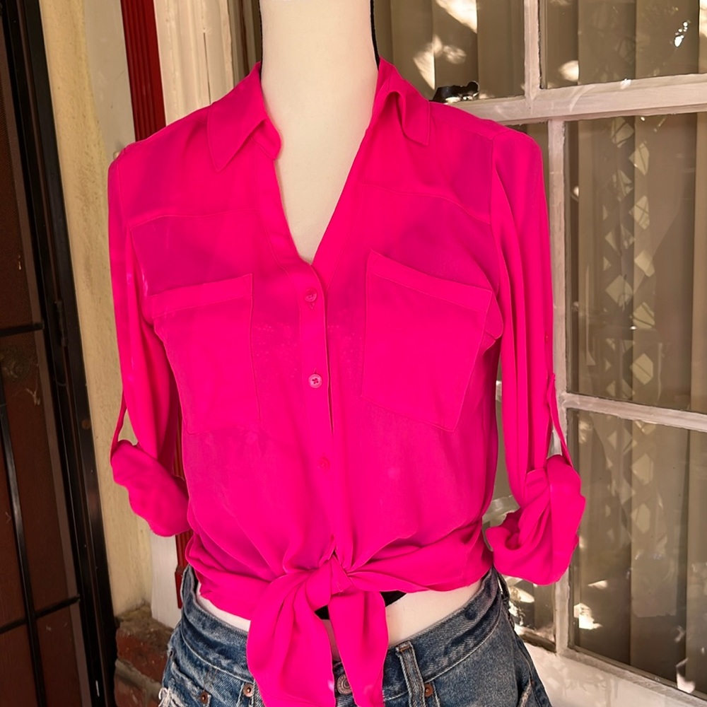 Express women’s Portofino long sleeve blouse in hot pink and has convertible sle